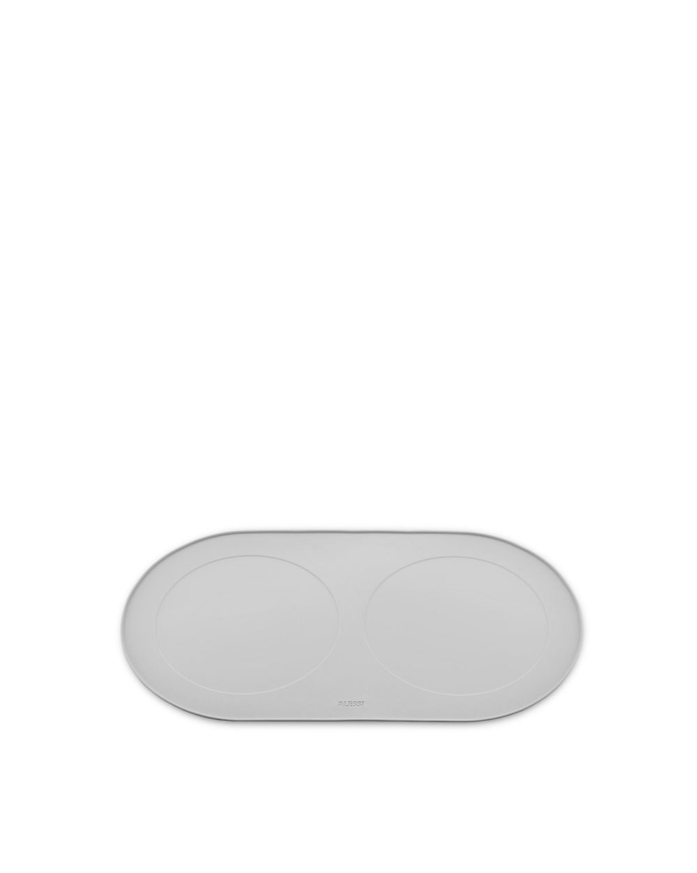 Grey oval pet feeding mat by Alessi with two circular indentations and embossed logo.
