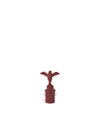 A reddish-brown bottle stopper with a bird figure by Alessi, featuring a cylindrical base with two metal loops.