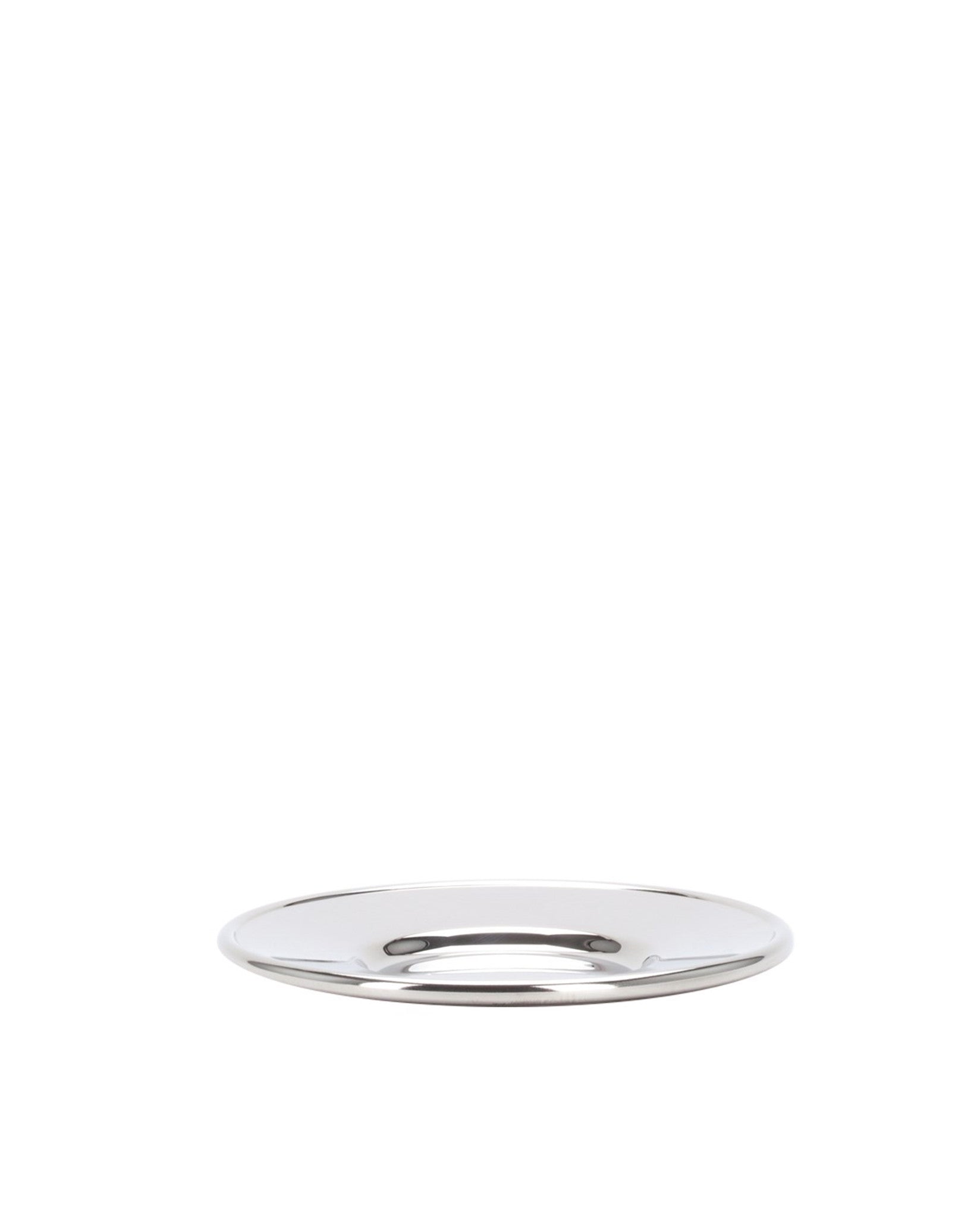 Polished silver-tone metal disc by Alessi, shallow and round, with a highly reflective surface.