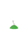 White cat-like Spare Part by Alessi, sitting on a smooth green mound.