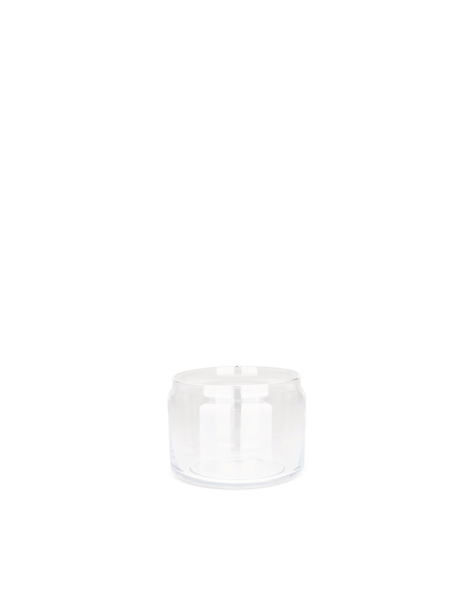 Clear spare glass jar by Alessi with a double-walled cylindrical design.