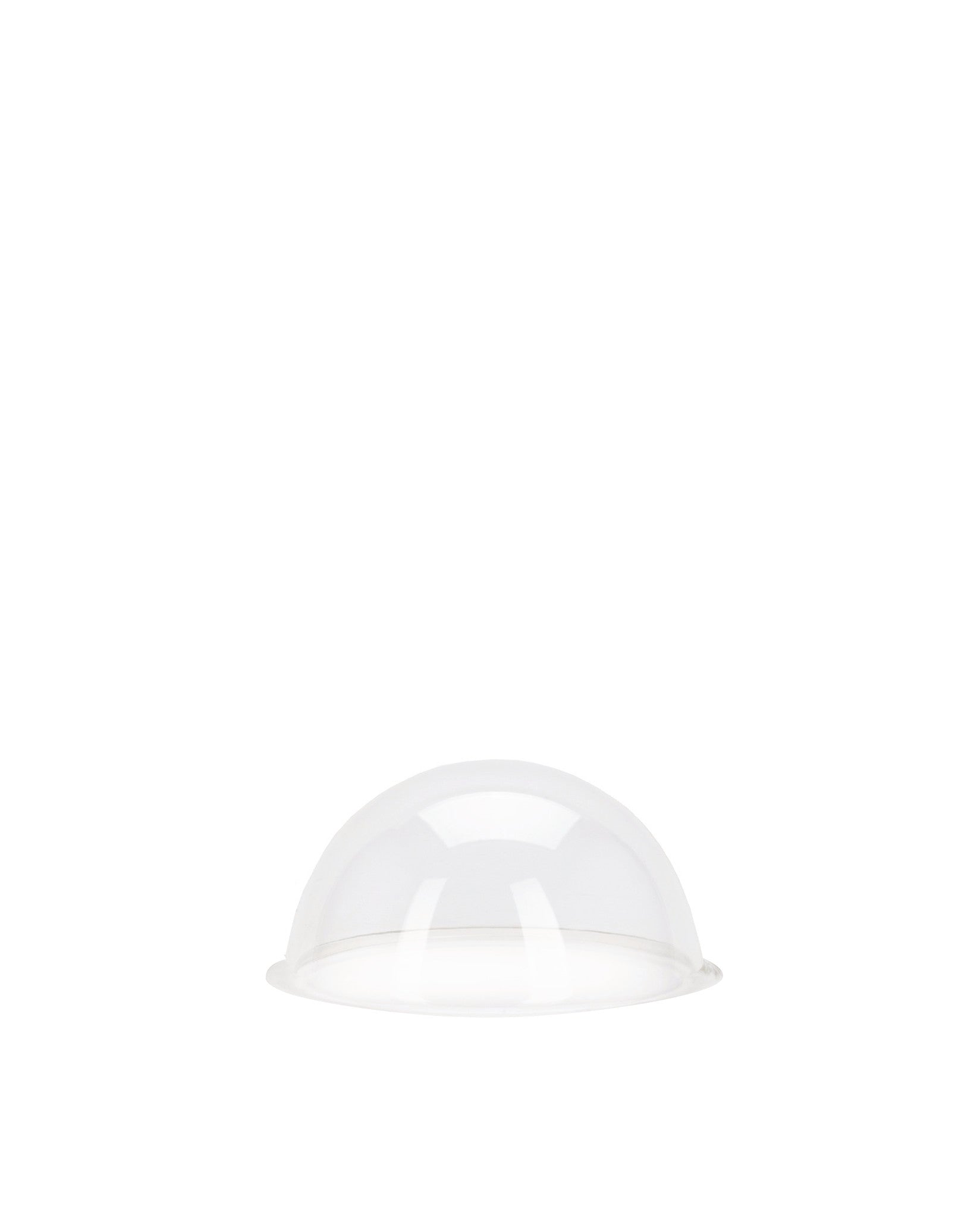 Clear dome spare part by Alessi with a flat base, isolated on a white background.