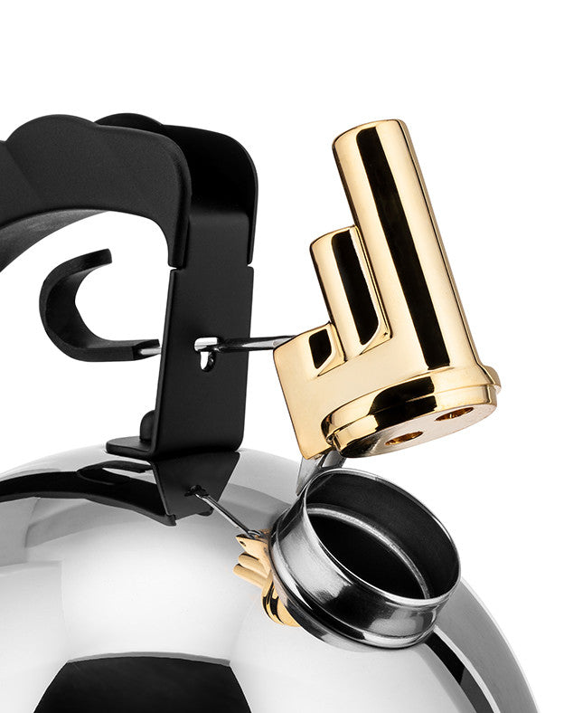 Alessi 9091 kettle with brass bird whistle designed by Richard Sapper